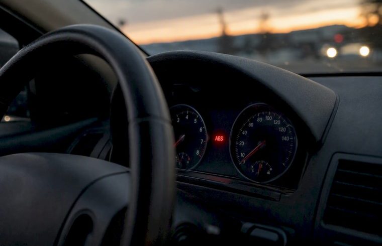 Close-up of car dashboard ABS warning light