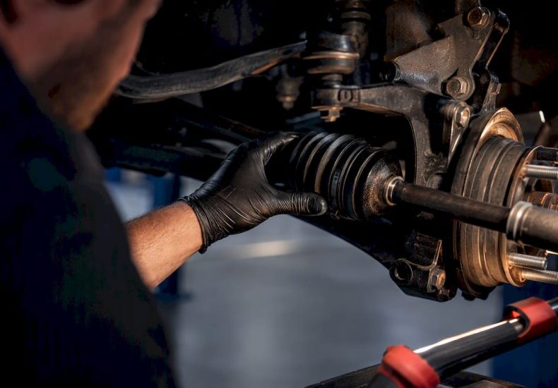 Close view of clicking CV axle joint